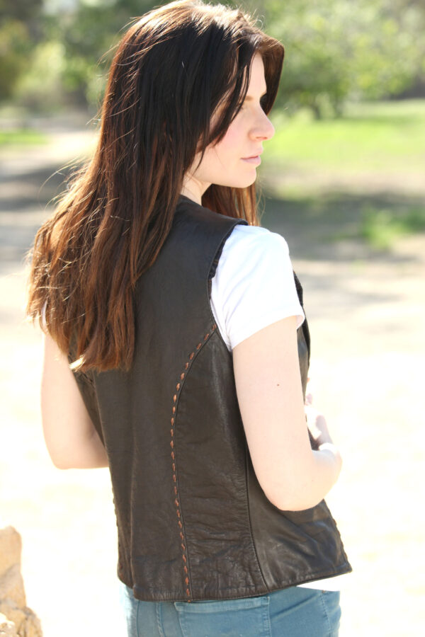 Women hand tooled vests