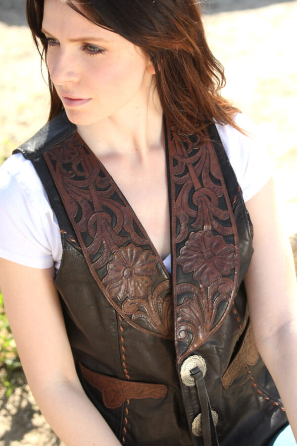 Women hand tooled vests